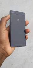 May be an image of phone and text that says 'HUAWEI'