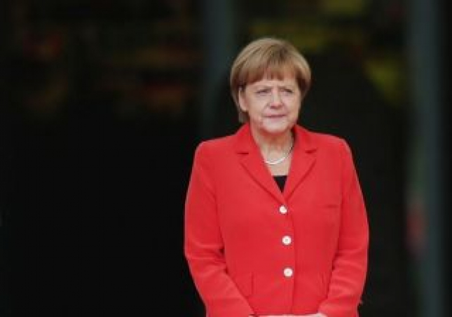 Angela Merkel e Xi Jinping decidem adiar cimeira UE-China